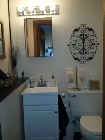 400 Walnut Plain Road Rochester, MA 02770 - Photo 14 of 24 a bathroom with a toilet sink and mirror