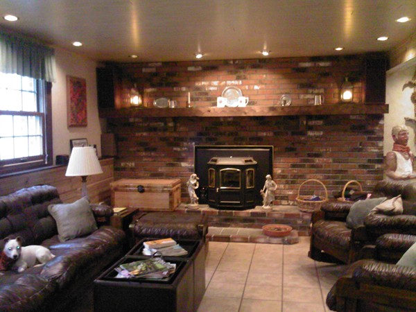 400 Walnut Plain Road Rochester, MA 02770 - Photo 16 of 24 a living room with furniture and a fireplace