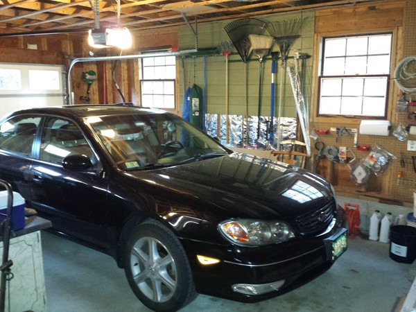 400 Walnut Plain Road Rochester, MA 02770 - Photo 22 of 24 a car parked in a garage