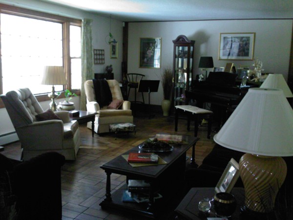 400 Walnut Plain Road Rochester, MA 02770 - Photo 4 of 24 a living room with furniture and wooden floor