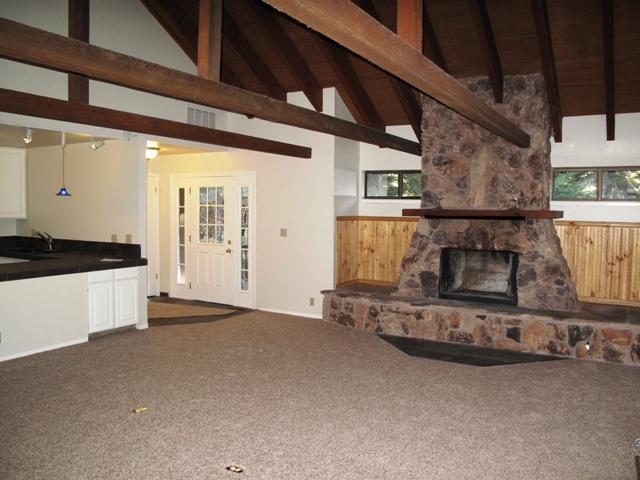 1013 Martis Landing Truckee, CA 96161 - Photo 5 of 10 a view of an empty room with a fireplace