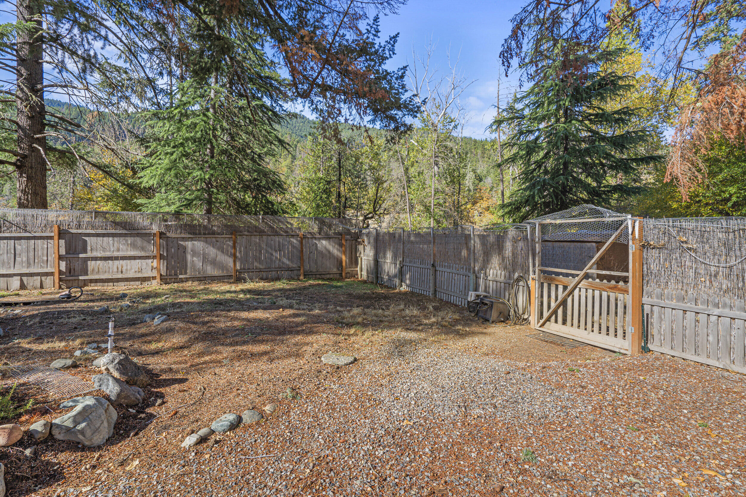14100 Upper Applegate Road Jacksonville, OR 97530 - Photo 27 of 30 a view of a backyard with tree