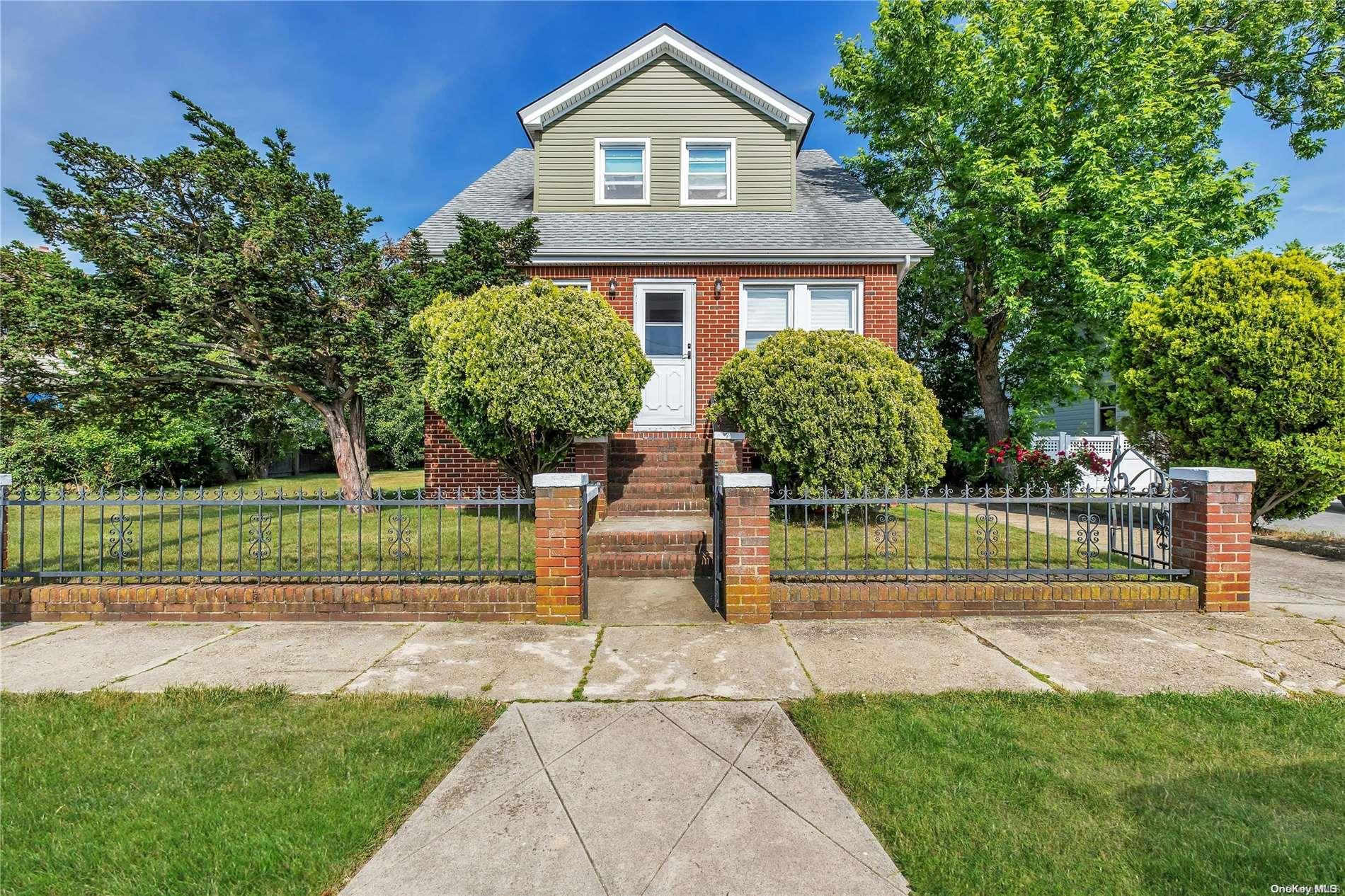 129 Parma Road Island Park, NY 11558 - Photo 1 of 1 Front of home