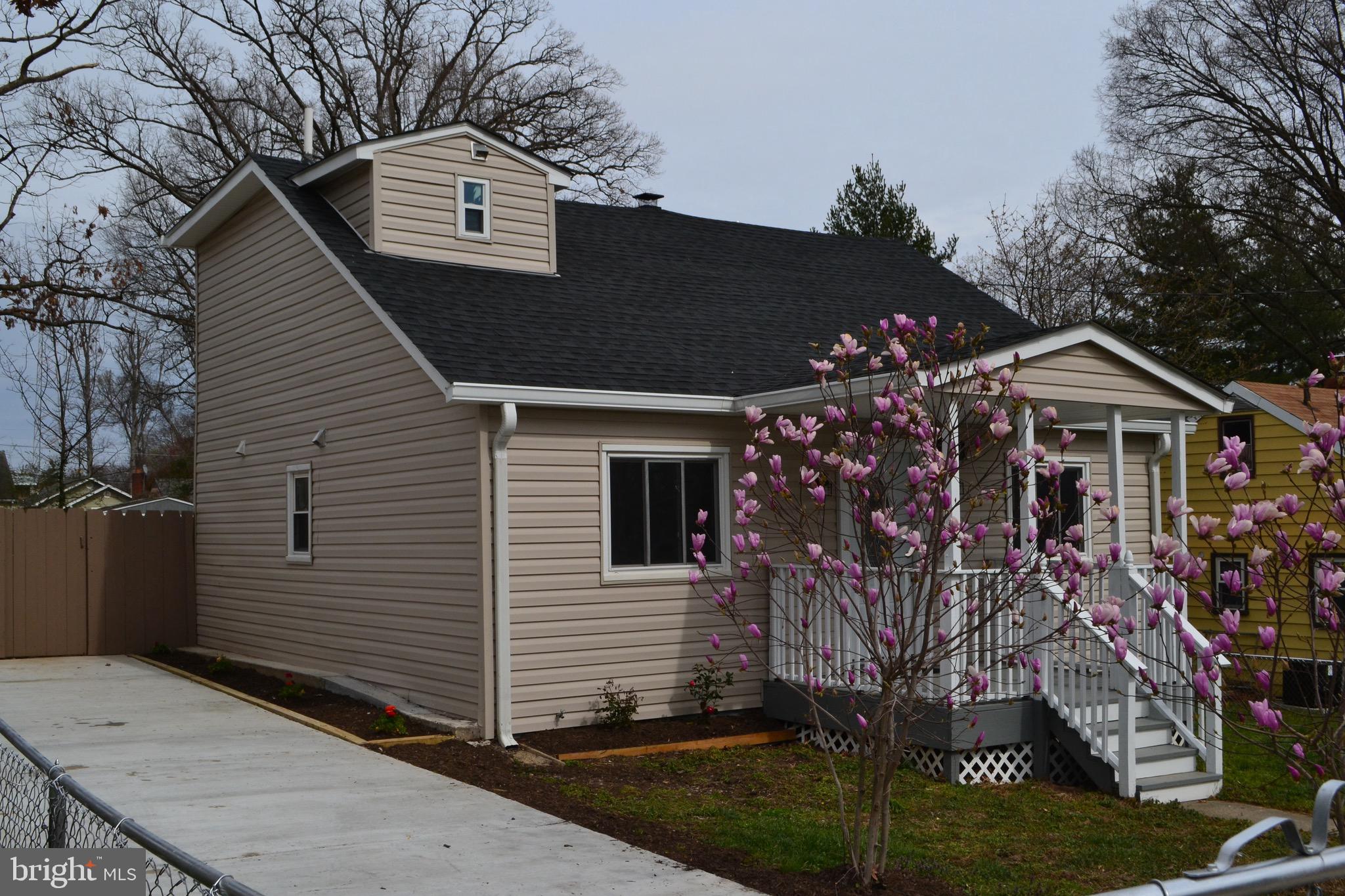7714 Frederick Road Hyattsville, MD 20784 - Photo 2 of 12 New Concrete Driveway, siding and roof.