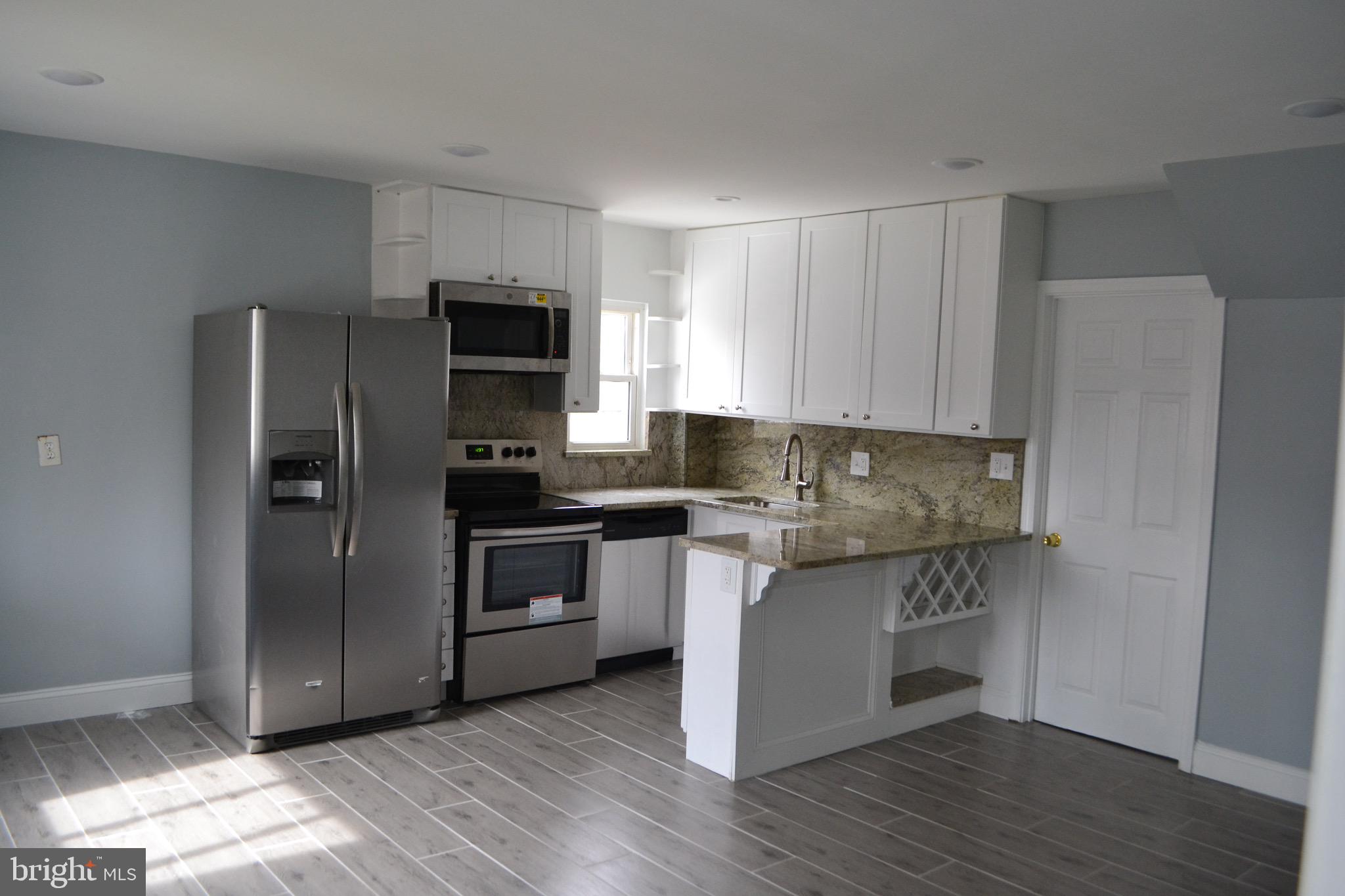 7714 Frederick Road Hyattsville, MD 20784 - Photo 3 of 12 New Kitchen.