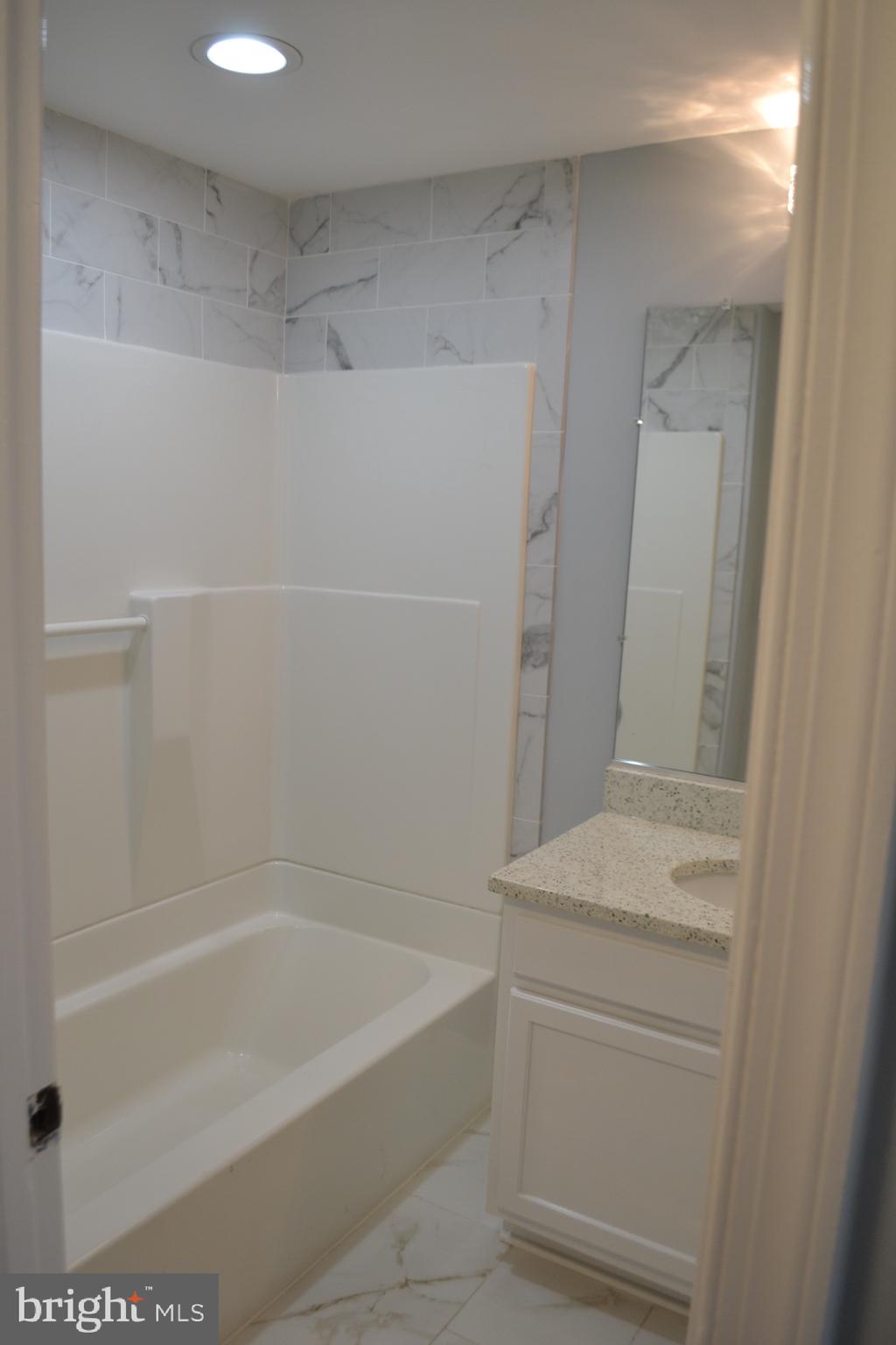 7714 Frederick Road Hyattsville, MD 20784 - Photo 4 of 12 Full Bathroom-Main Level