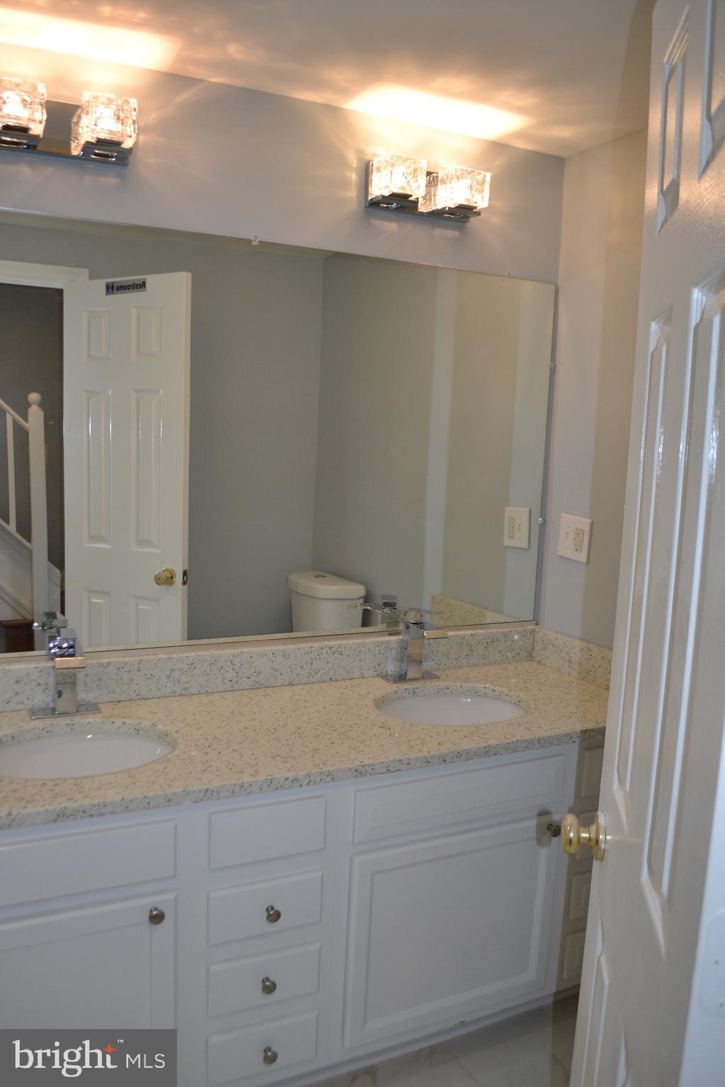 7714 Frederick Road Hyattsville, MD 20784 - Photo 5 of 12 Double sink updated main level bathroom