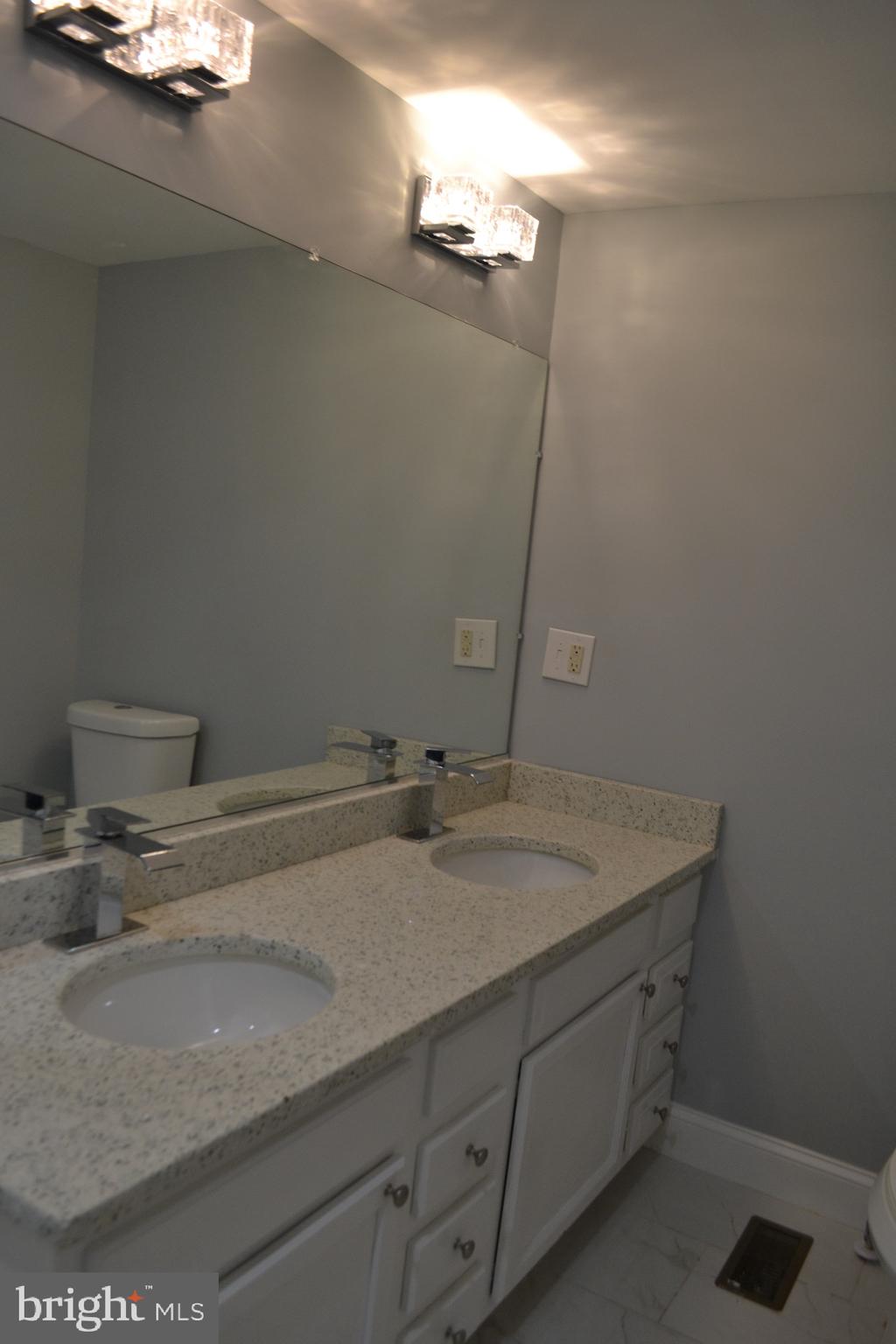 7714 Frederick Road Hyattsville, MD 20784 - Photo 6 of 12 Updated bathroom