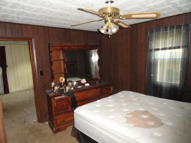 1245 Sarver Road Sarver, PA 16055 - Photo 8 of 10 a bedroom with a bed and ceiling fan