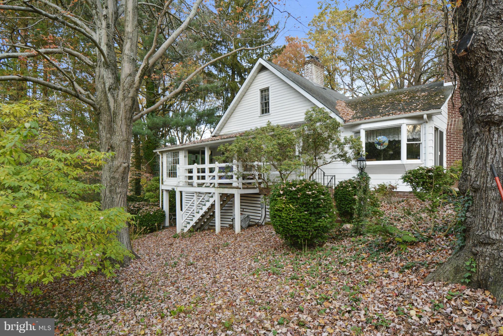 2227 Carroll Mill Road Phoenix, MD 21131 - Photo 1 of 30 a front view of a house with garden