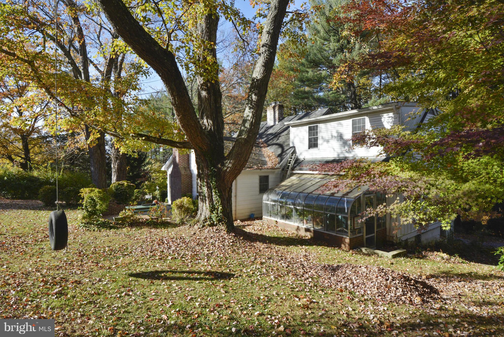 2227 Carroll Mill Road Phoenix, MD 21131 - Photo 5 of 30 a front view of a house with a yard