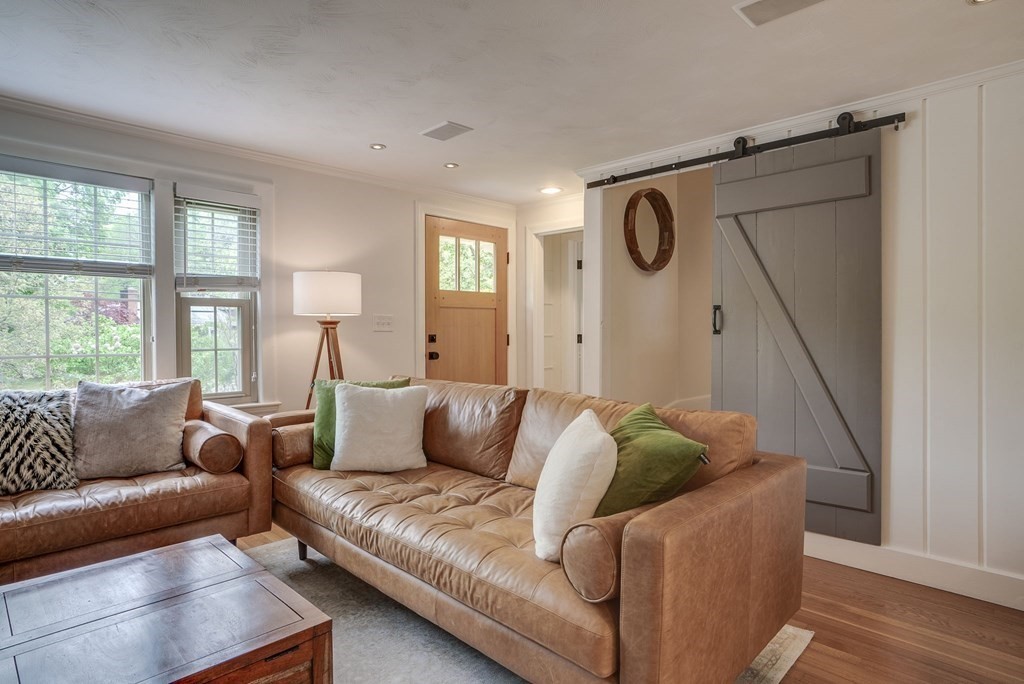 290 Concord Road Bedford, MA 01730 - Photo 10 of 41 a living room with furniture and a window