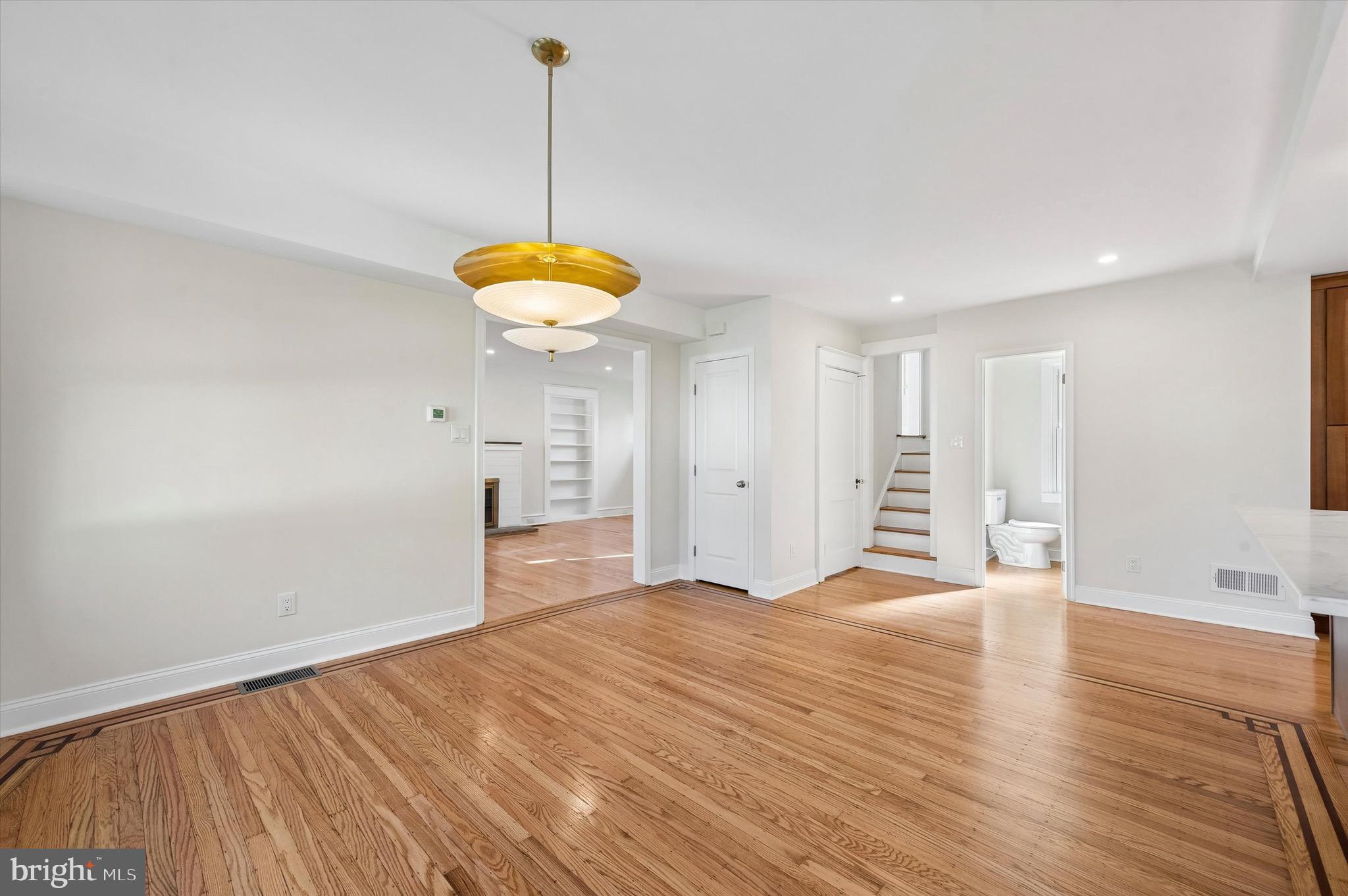 100 Yale Road Havertown, PA 19083 - Photo 11 of 35 a view of empty room with wooden floor and fan