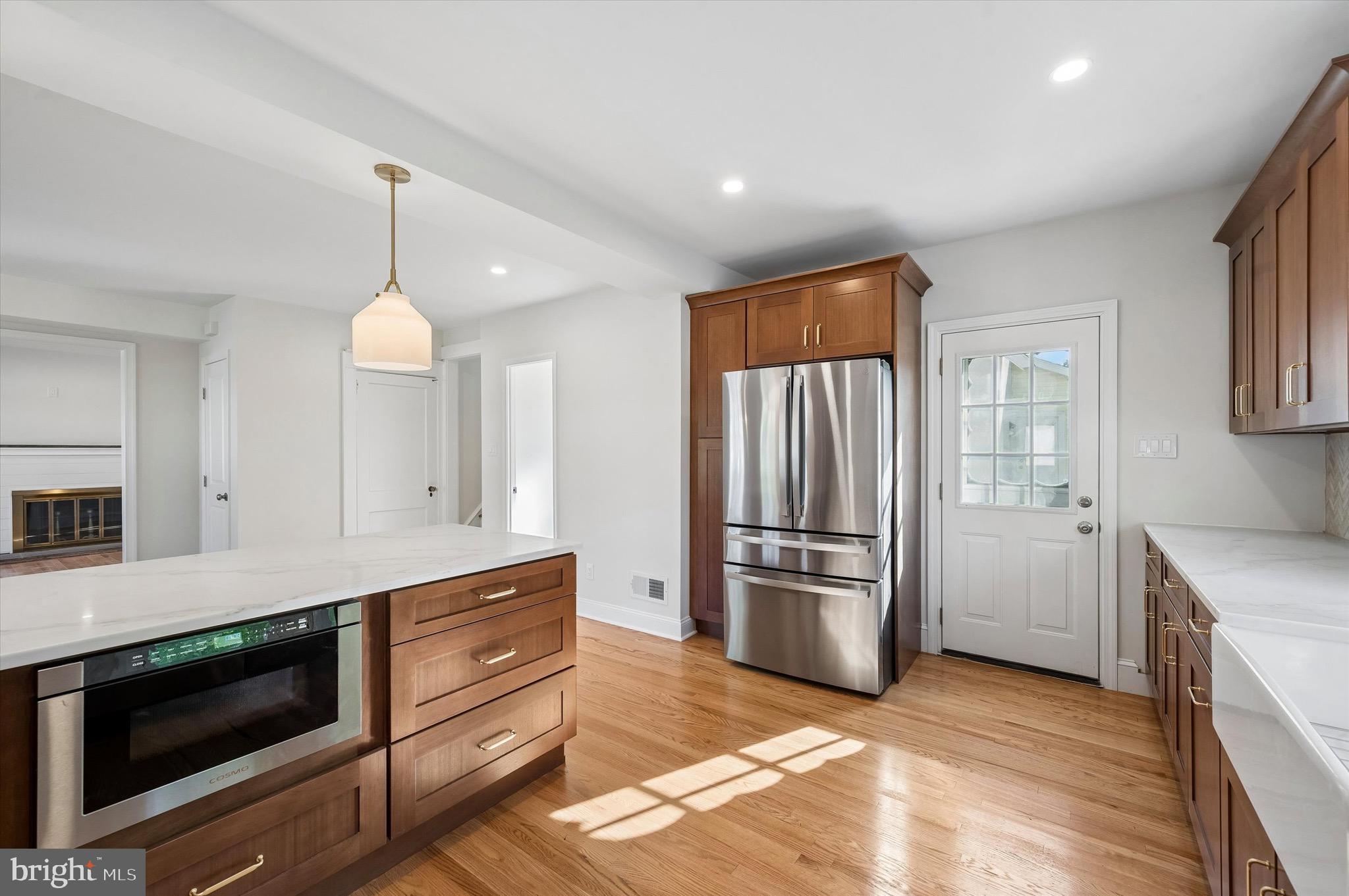 100 Yale Road Havertown, PA 19083 - Photo 15 of 35 a kitchen with stainless steel appliances granite countertop a refrigerator and a stove top oven