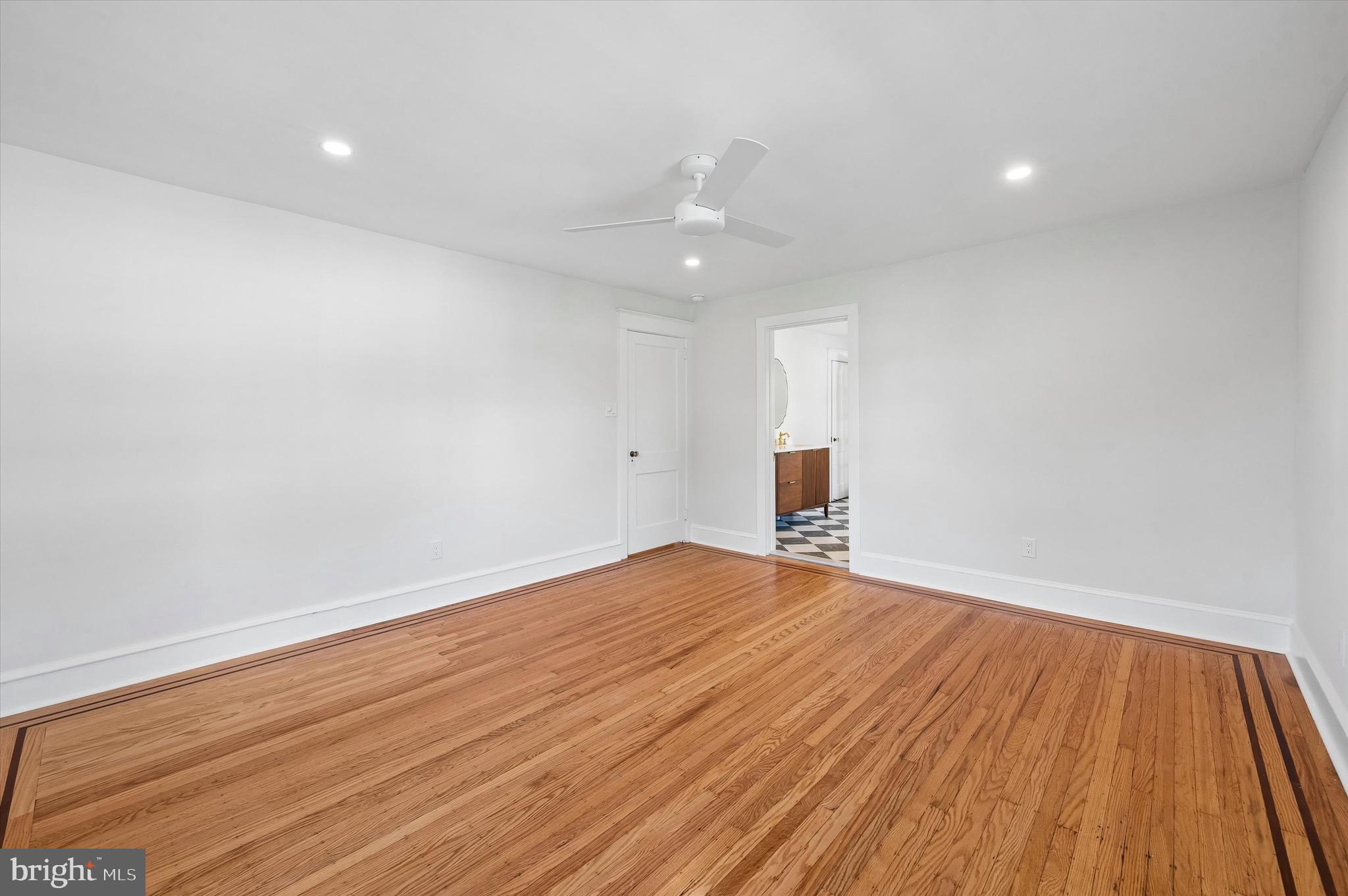 100 Yale Road Havertown, PA 19083 - Photo 20 of 35 a view of empty room with wooden floor and fan