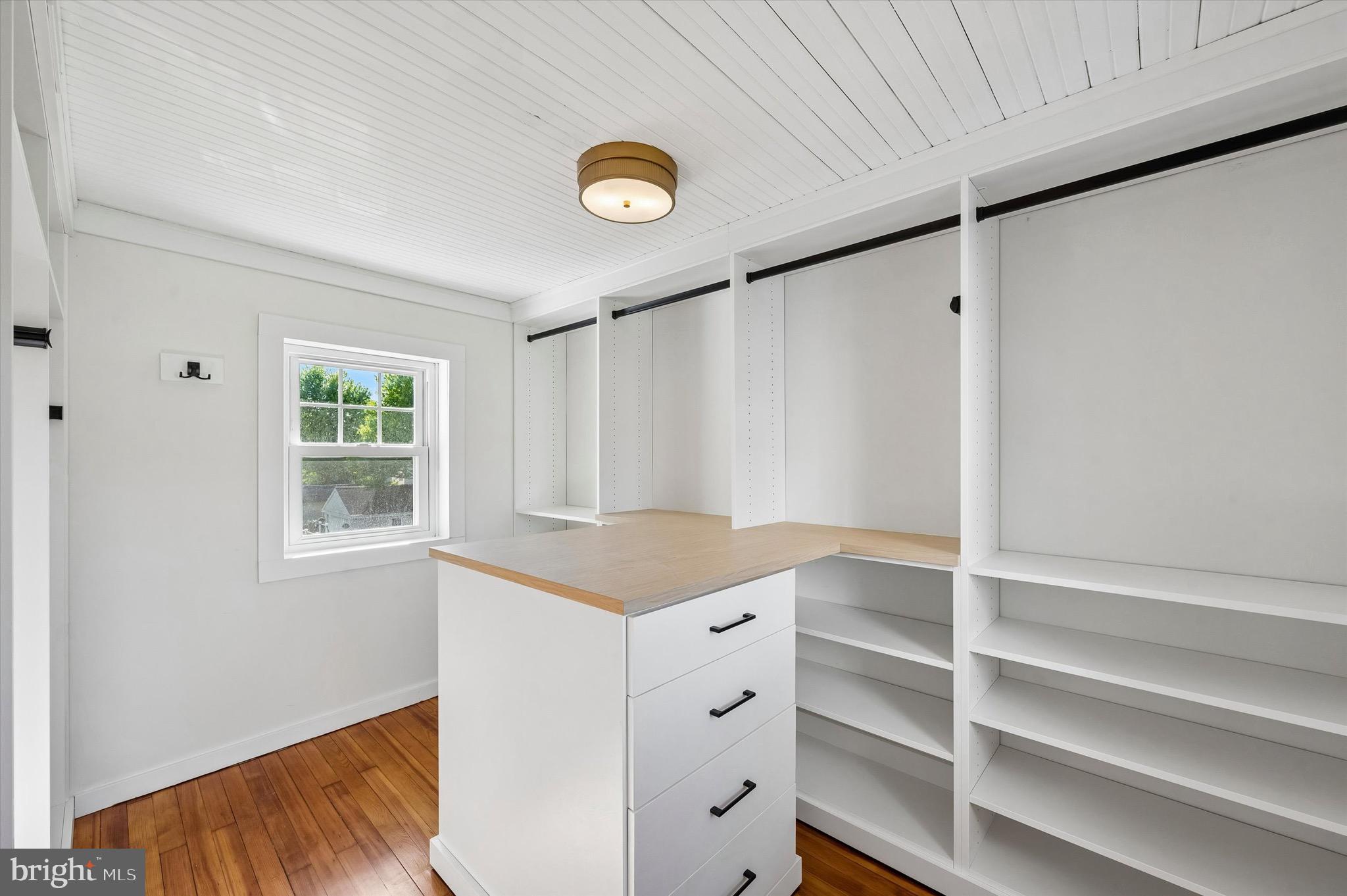 100 Yale Road Havertown, PA 19083 - Photo 24 of 35 a kitchen with white cabinets and window