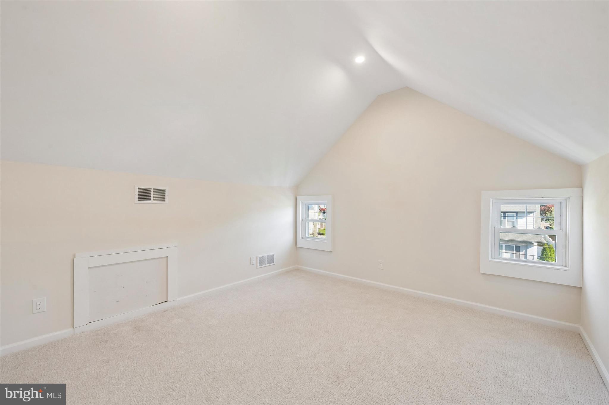 100 Yale Road Havertown, PA 19083 - Photo 28 of 35 an empty room with windows and white walls
