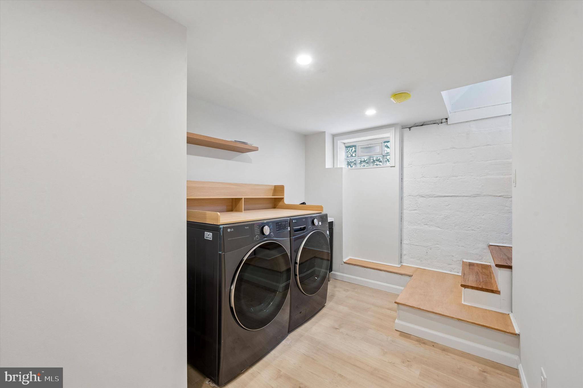 100 Yale Road Havertown, PA 19083 - Photo 29 of 35 a view of a storage & utility room with washer and dryer