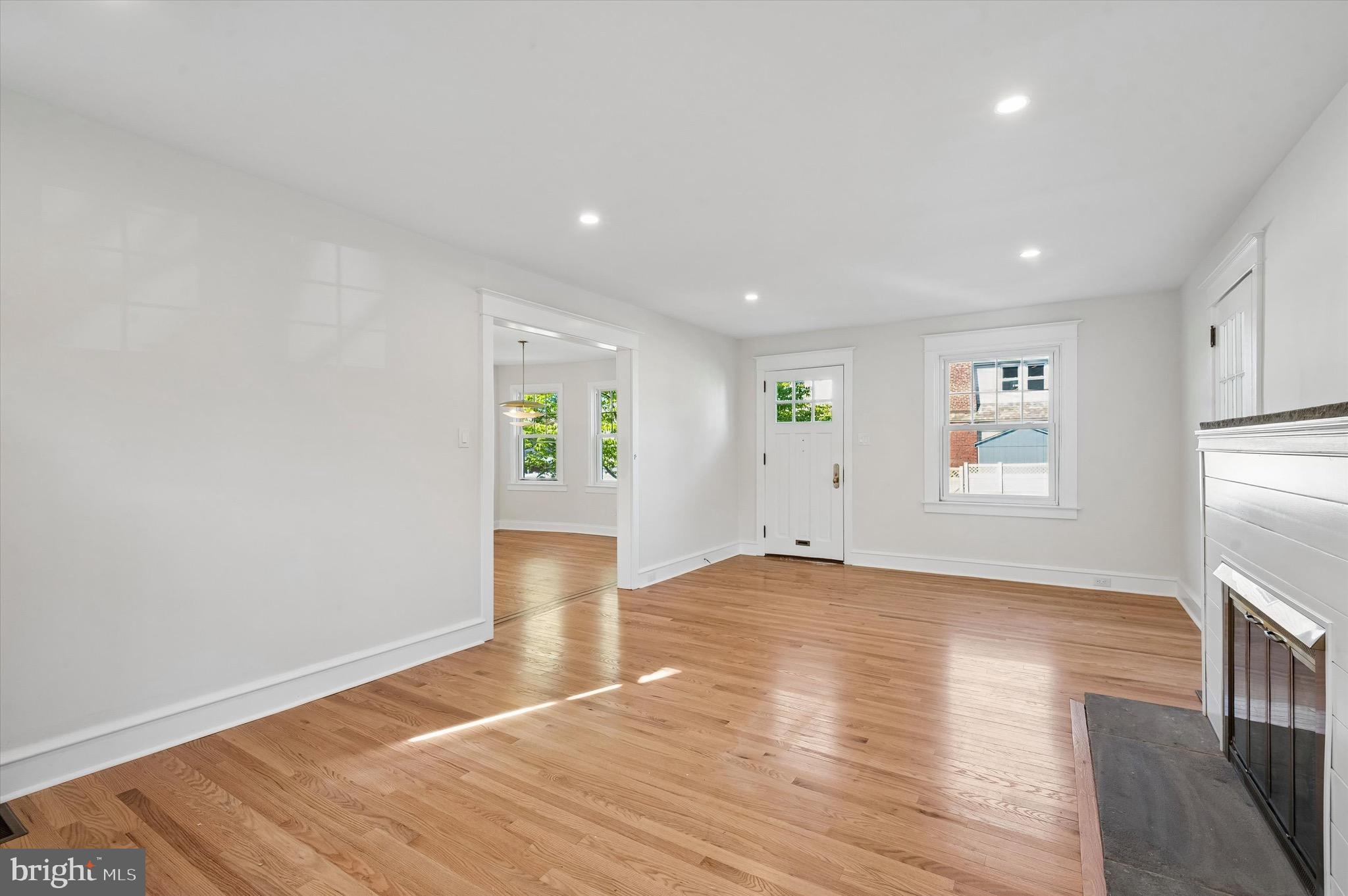 100 Yale Road Havertown, PA 19083 - Photo 6 of 35 a view of an empty room with window and wooden floor