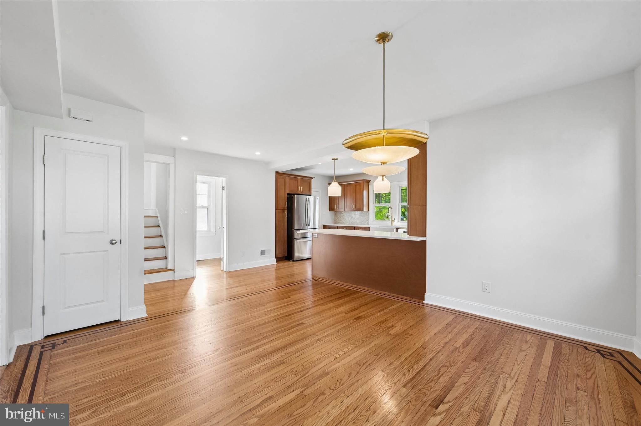 100 Yale Road Havertown, PA 19083 - Photo 10 of 35 a view of a room with wooden floor kitchen view and a window