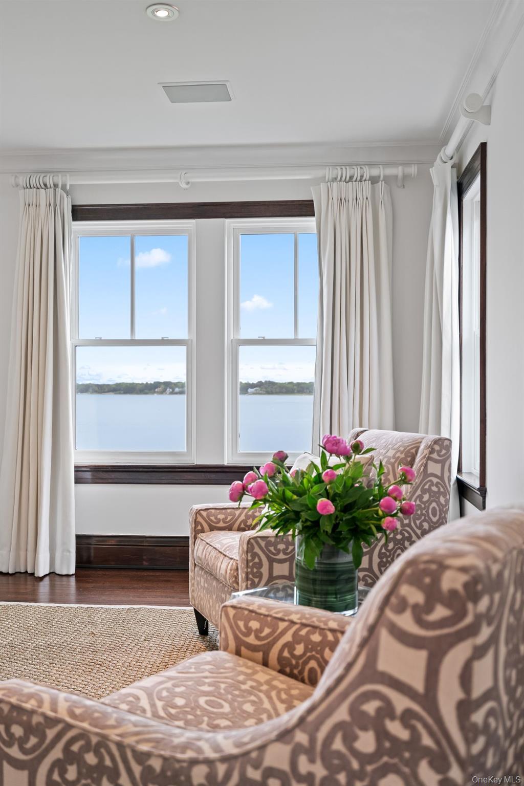 998 West Shore Road Mill Neck, NY 11765 - Photo 18 of 36 a living room with a bed and a window