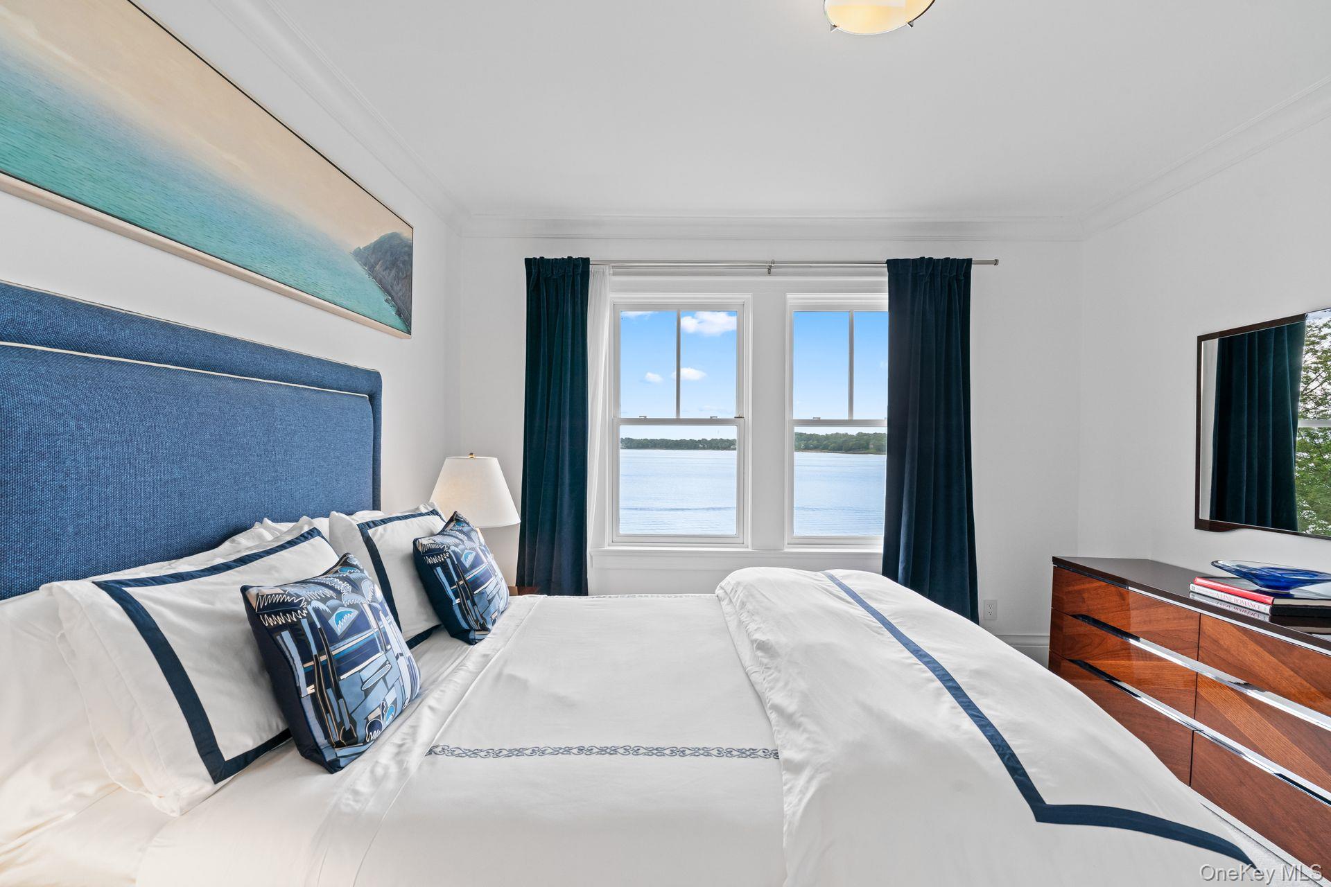 998 West Shore Road Mill Neck, NY 11765 - Photo 22 of 36 a bedroom with bed and window