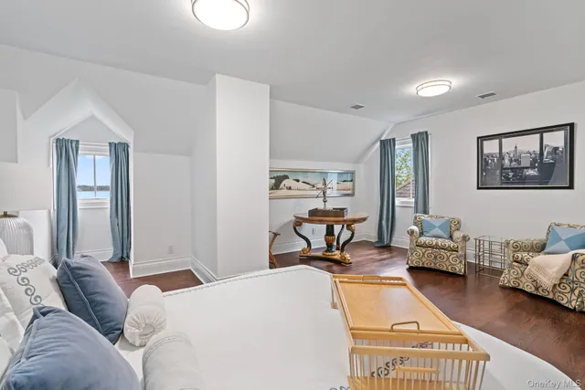 a bedroom with furniture and a couch