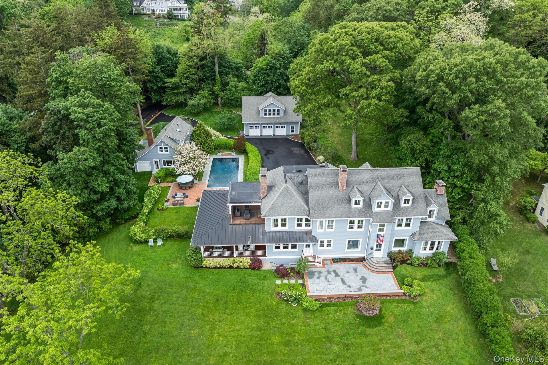 998 West Shore Road Mill Neck, NY 11765 - Photo 33 of 36 an aerial view of a house with garden space and street view