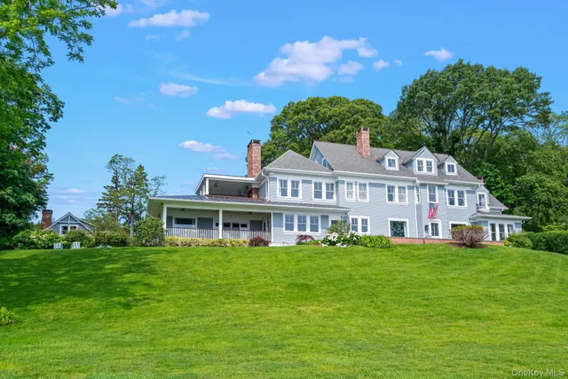 a view of a house with a big yard