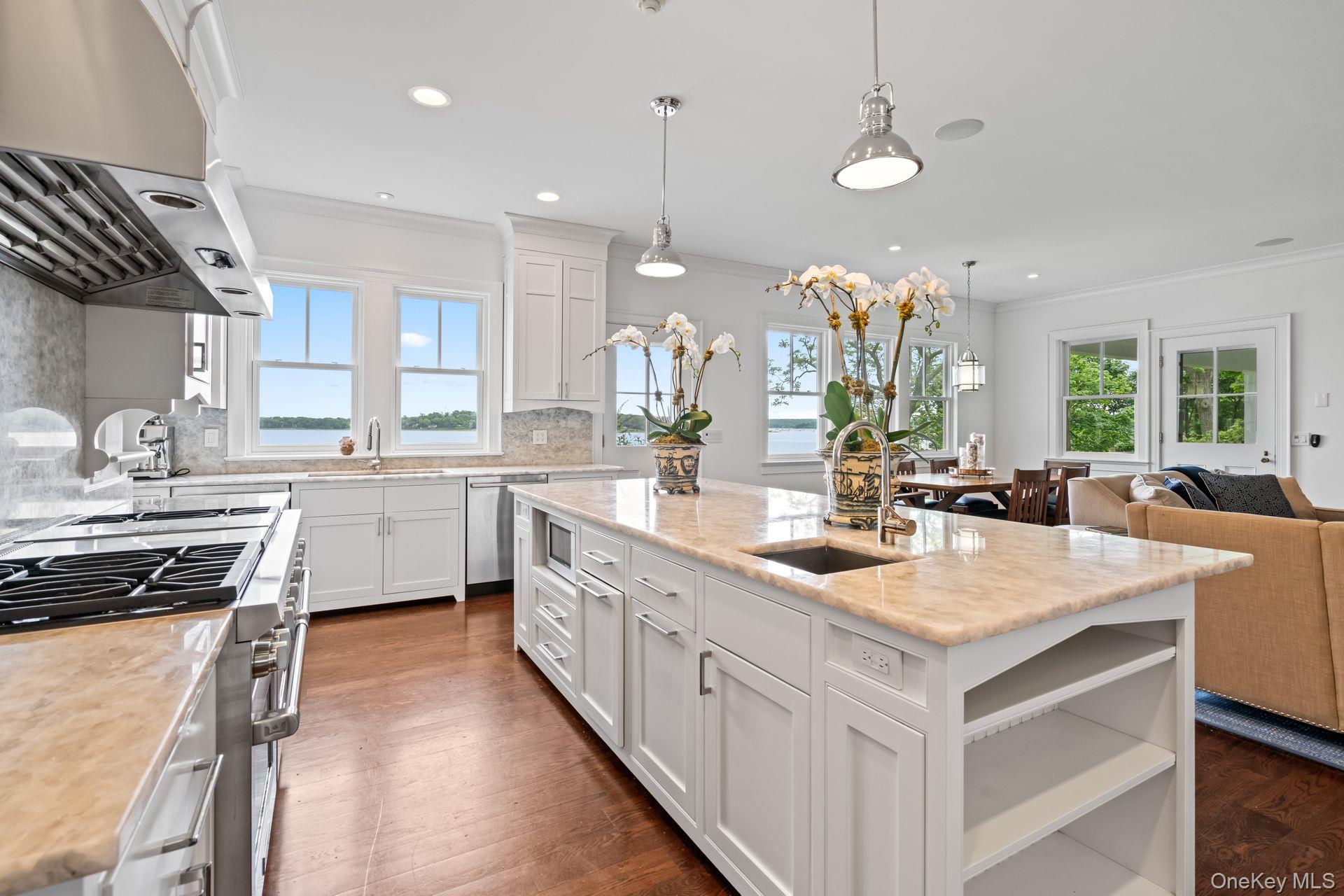 998 West Shore Road Mill Neck, NY 11765 - Photo 8 of 36 a kitchen with sink stove and cabinets
