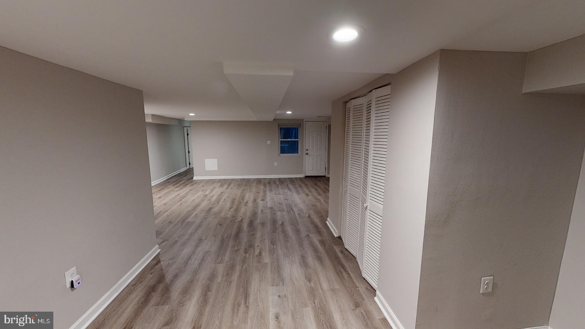 1133 Euclid Street Northwest, Unit B Washington, DC 20009 - Photo 5 of 11 a view of hallway with wooden floor