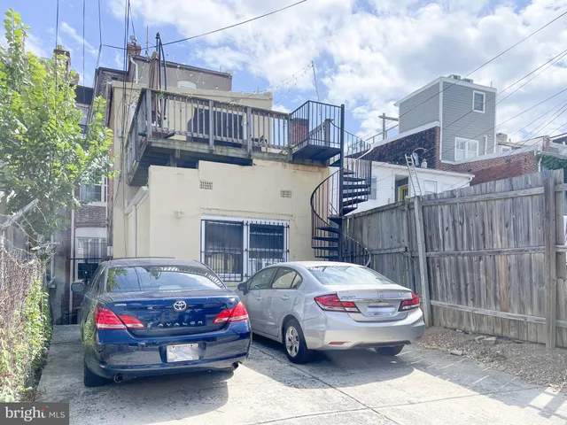 a car parked in front of a building