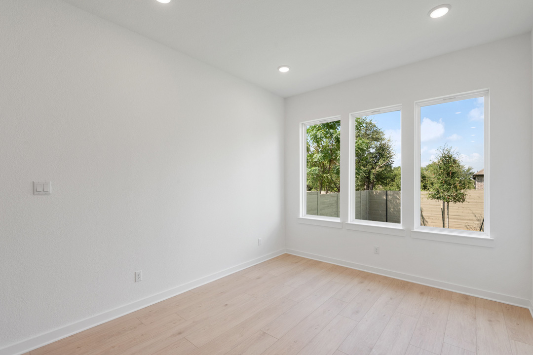 1114 Blue Moon Drive Georgetown, TX 78628 - Photo 19 of 39 an empty room with windows