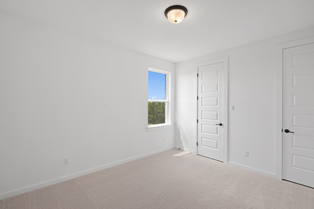 1114 Blue Moon Drive Georgetown, TX 78628 - Photo 32 of 39 an empty room with windows and closet