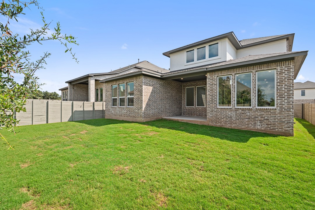 1114 Blue Moon Drive Georgetown, TX 78628 - Photo 36 of 39 a view of a house with yard and plants