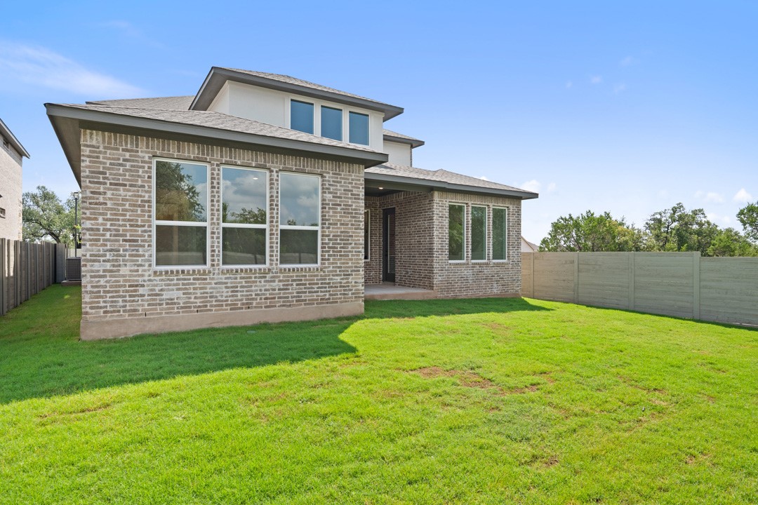 1114 Blue Moon Drive Georgetown, TX 78628 - Photo 38 of 39 a house view with a garden space
