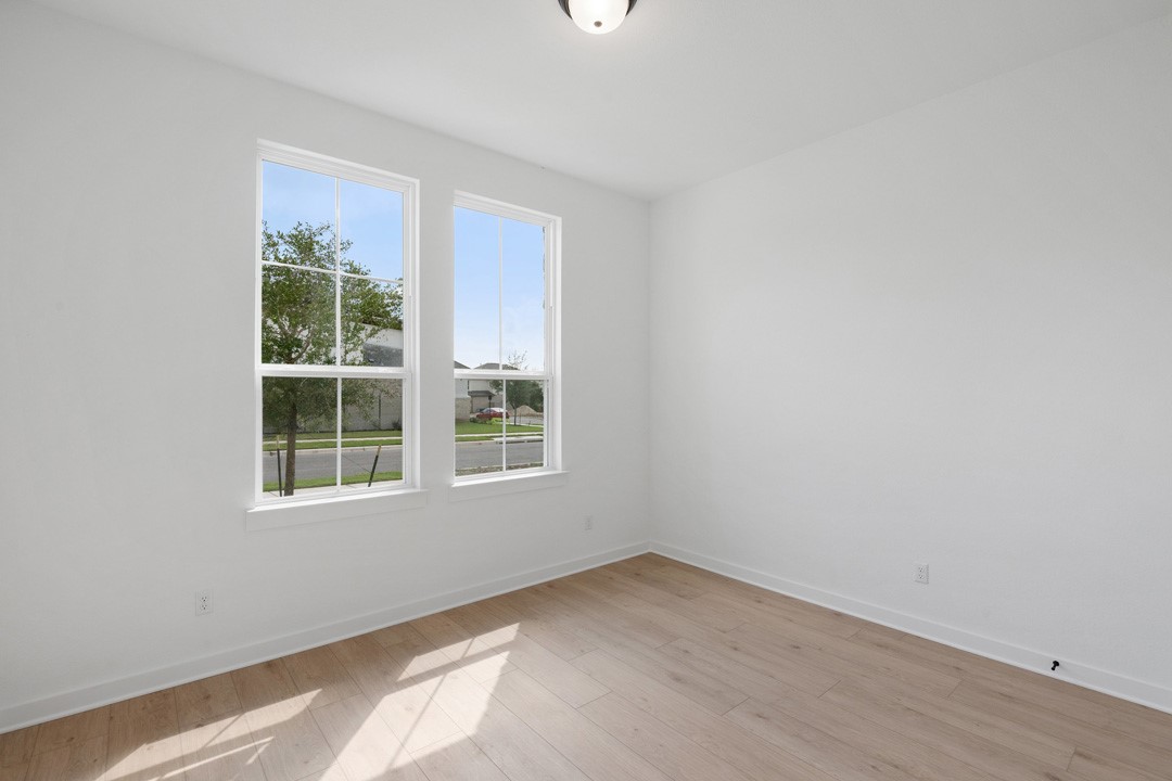1114 Blue Moon Drive Georgetown, TX 78628 - Photo 4 of 39 an empty room with a window