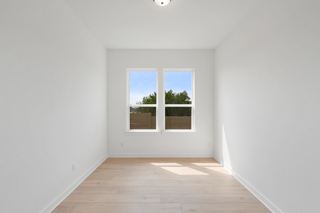 1114 Blue Moon Drive Georgetown, TX 78628 - Photo 6 of 39 a view of an empty room with a window