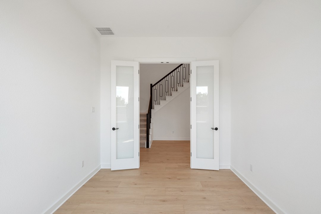 1114 Blue Moon Drive Georgetown, TX 78628 - Photo 7 of 39 a view of an empty room
