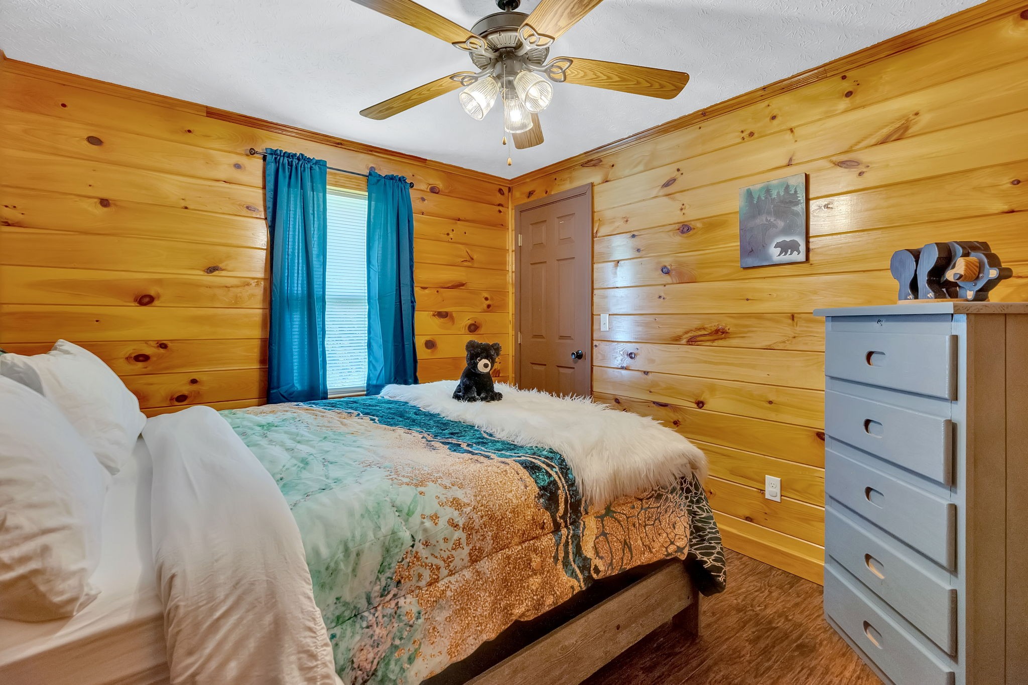 114 Ashley Road Jamestown, TN 38556 - Photo 15 of 29 a bedroom with a bed and a dresser