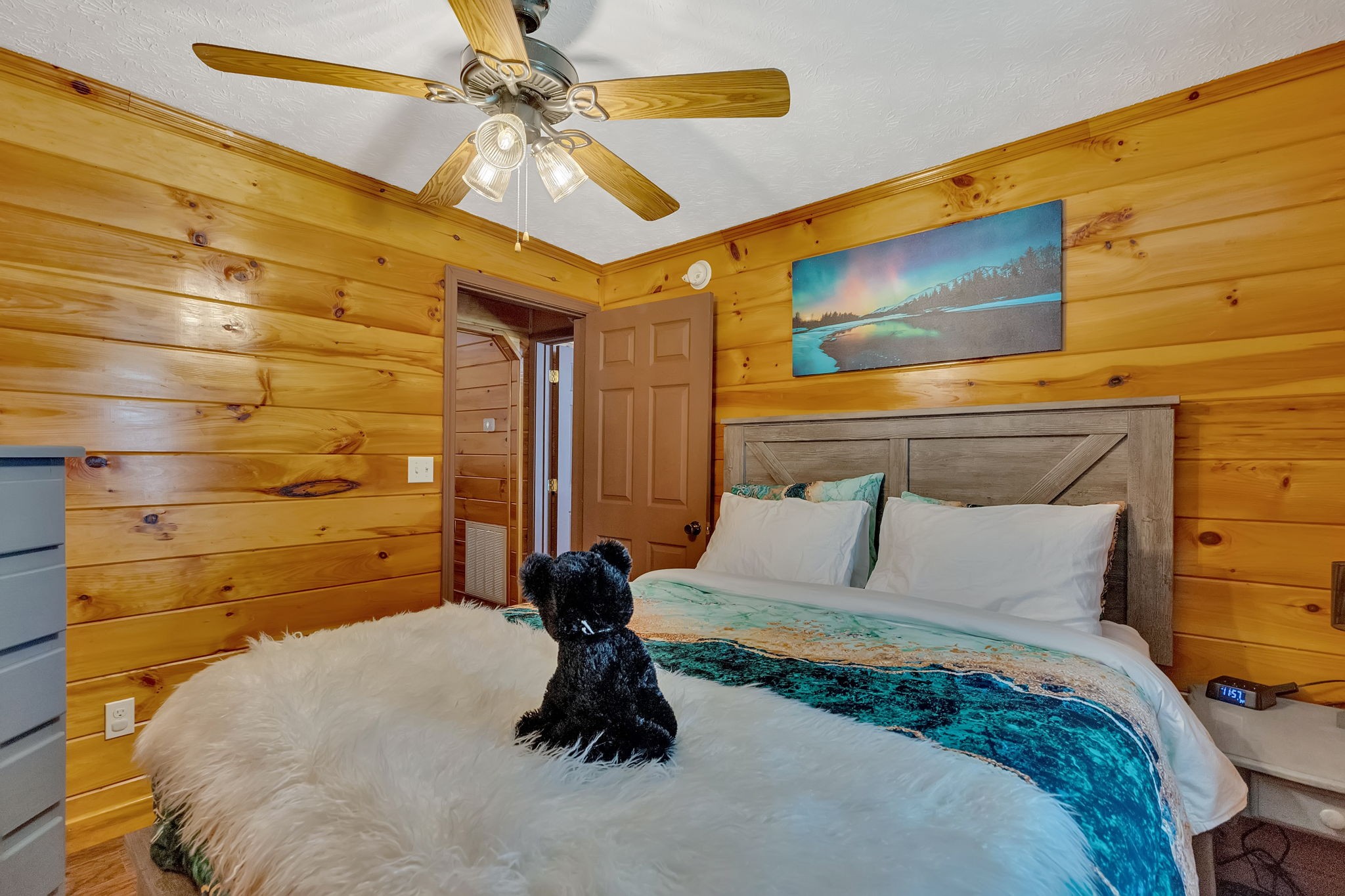 114 Ashley Road Jamestown, TN 38556 - Photo 16 of 29 a bedroom with a bed and a painting on the wall