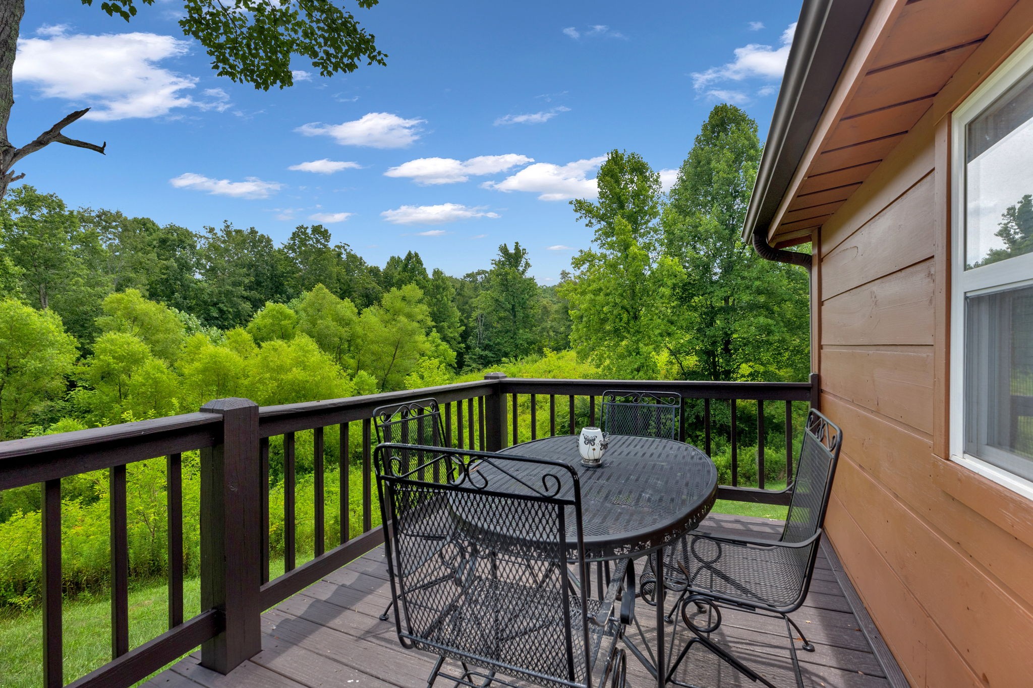 114 Ashley Road Jamestown, TN 38556 - Photo 20 of 29 a view of a balcony with a table and chairs