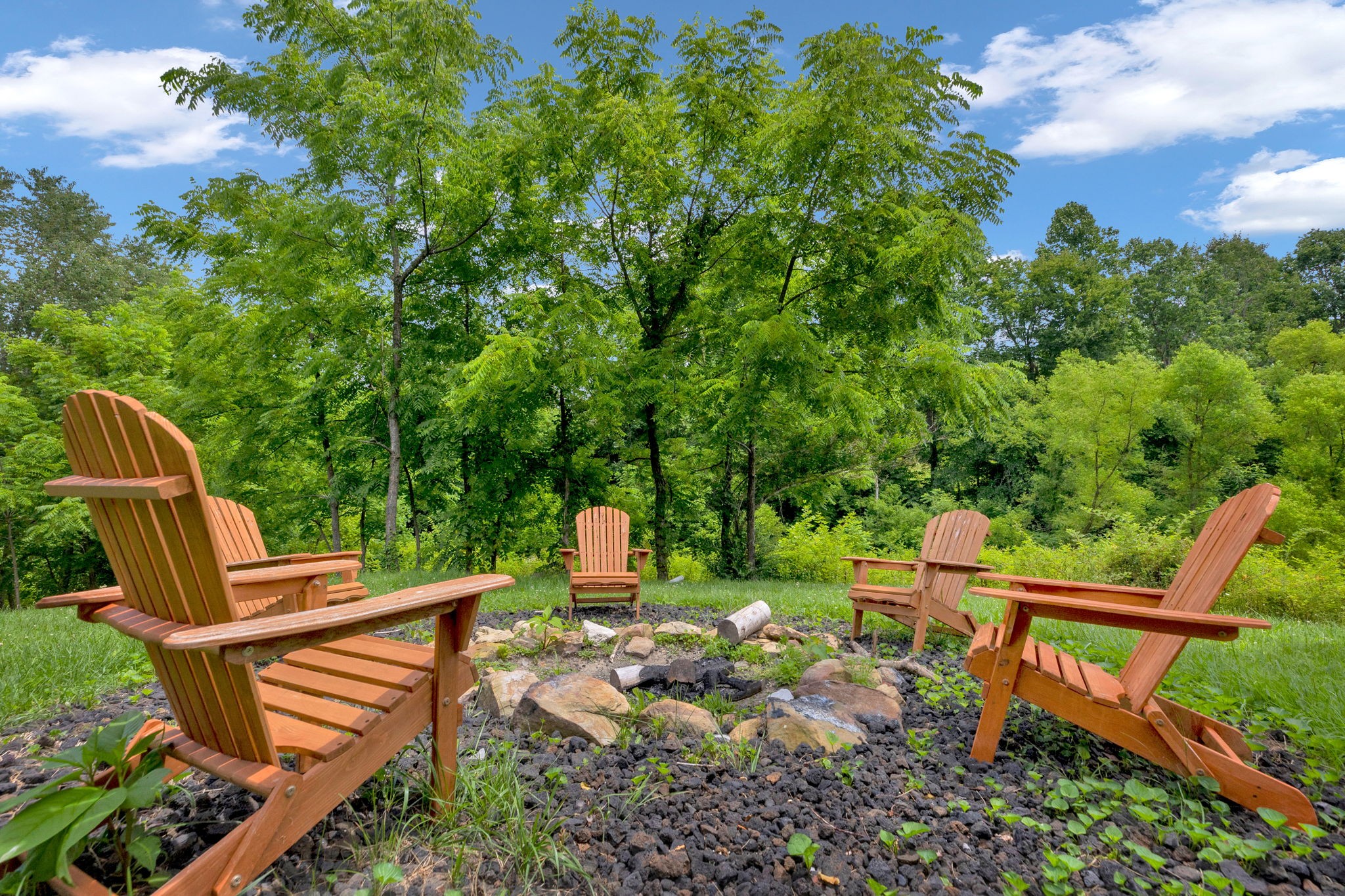 114 Ashley Road Jamestown, TN 38556 - Photo 22 of 29 a view of a chairs in a backyard