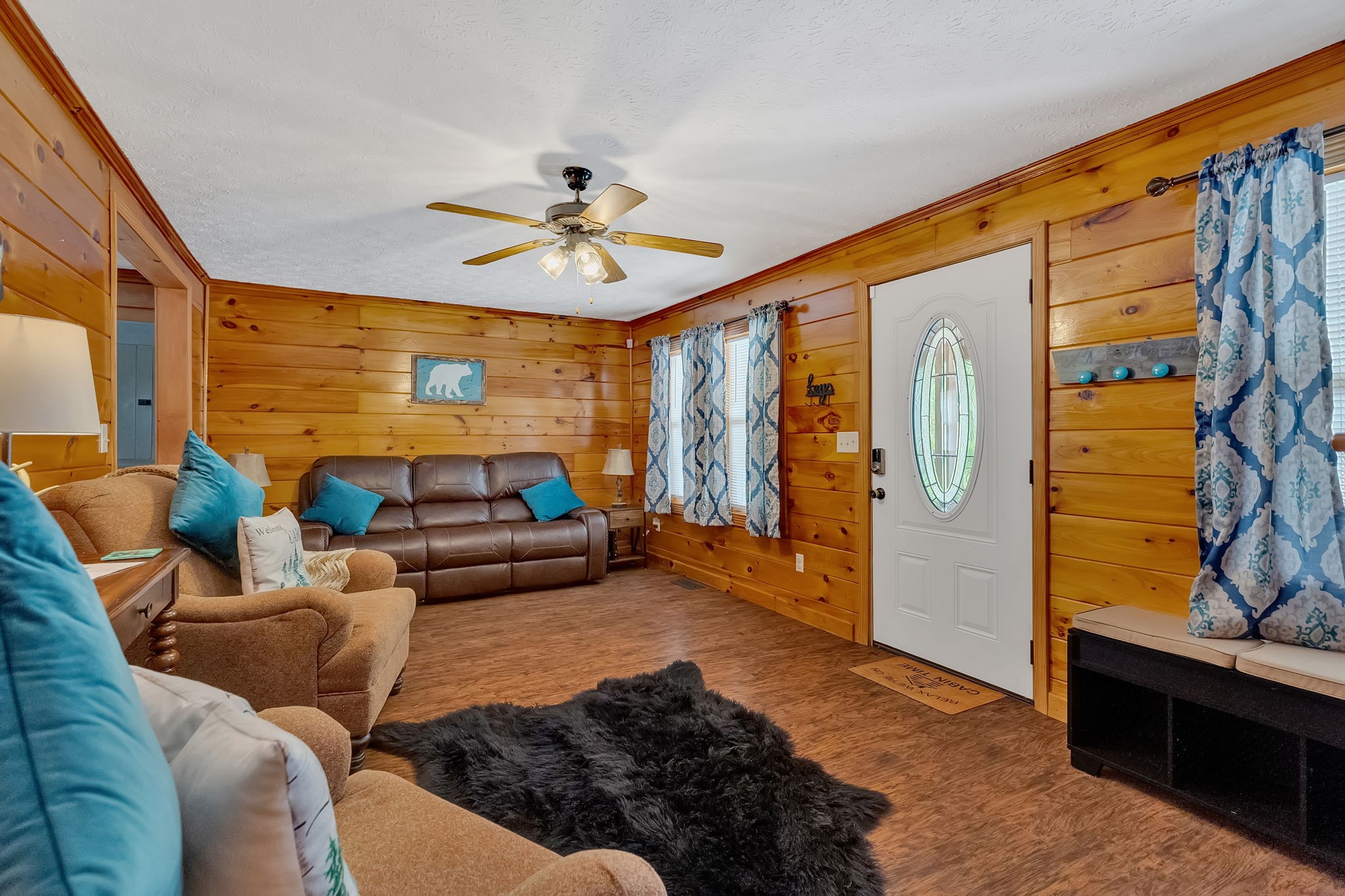 114 Ashley Road Jamestown, TN 38556 - Photo 3 of 29 a living room with furniture and a flat screen tv