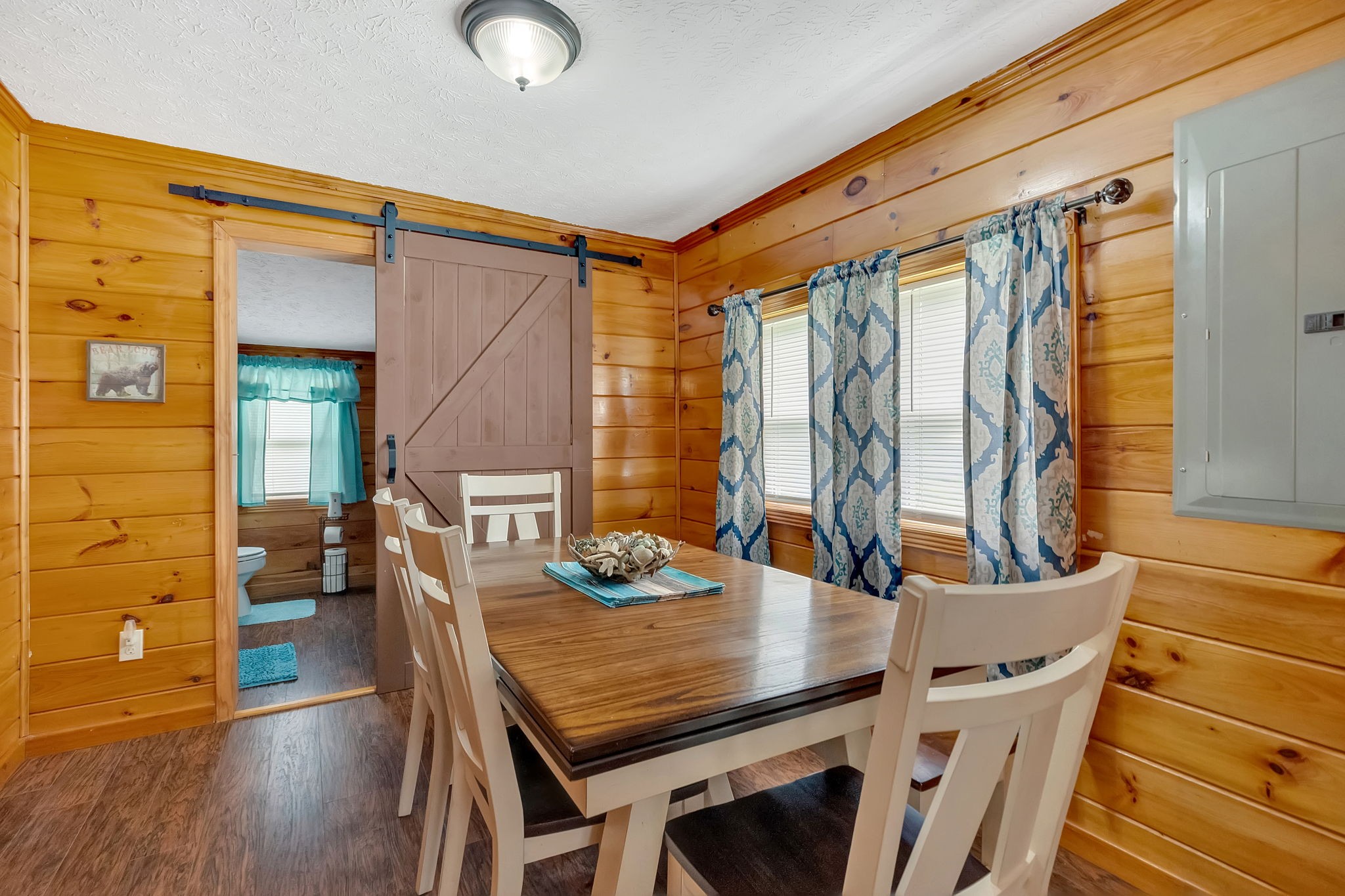 114 Ashley Road Jamestown, TN 38556 - Photo 7 of 29 a view of a dining room with furniture and wooden floor