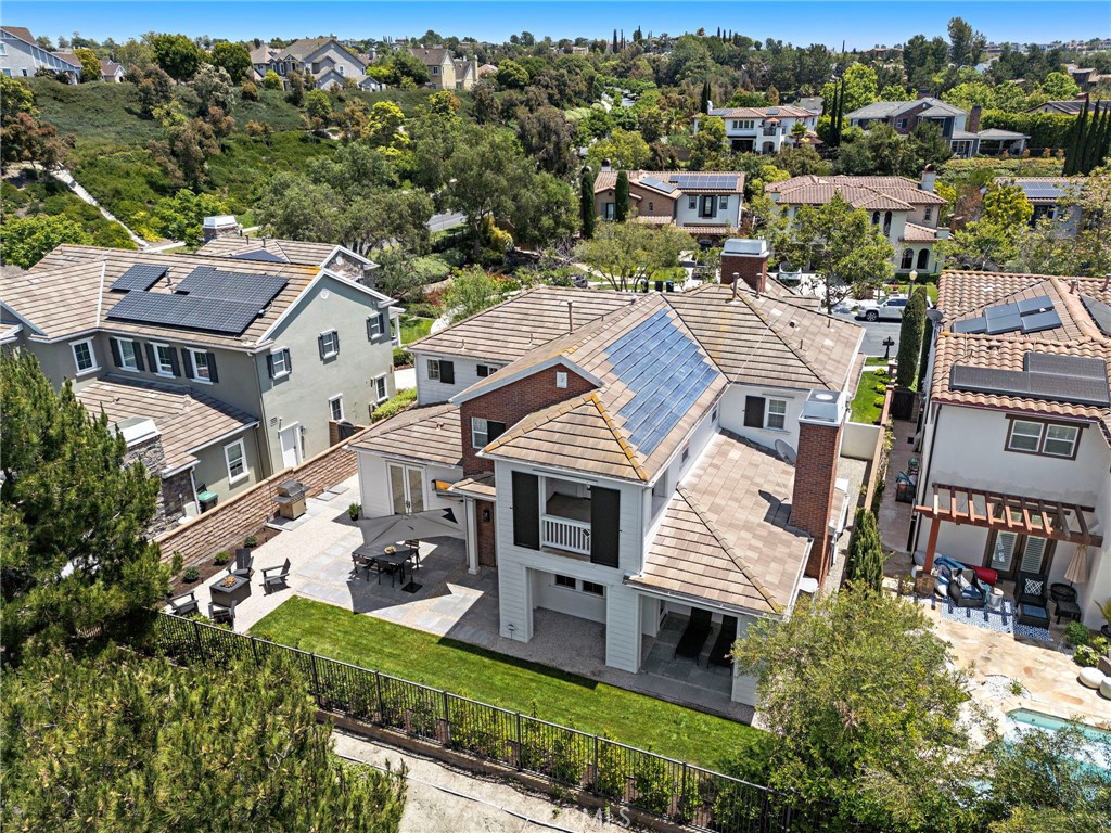 3 Tranquility Place Ladera Ranch, CA 92694 - Photo 56 of 63 an aerial view of a house with a garden