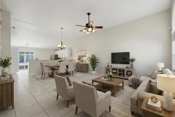 an empty room with cabinet and a chandelier fan