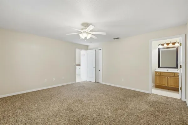 a view of a front door and bedroom