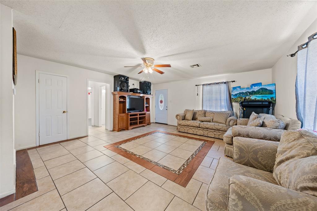 3524 Live Oak Avenue Waco, TX 76708 - Photo 3 of 19 a living room with furniture and a table