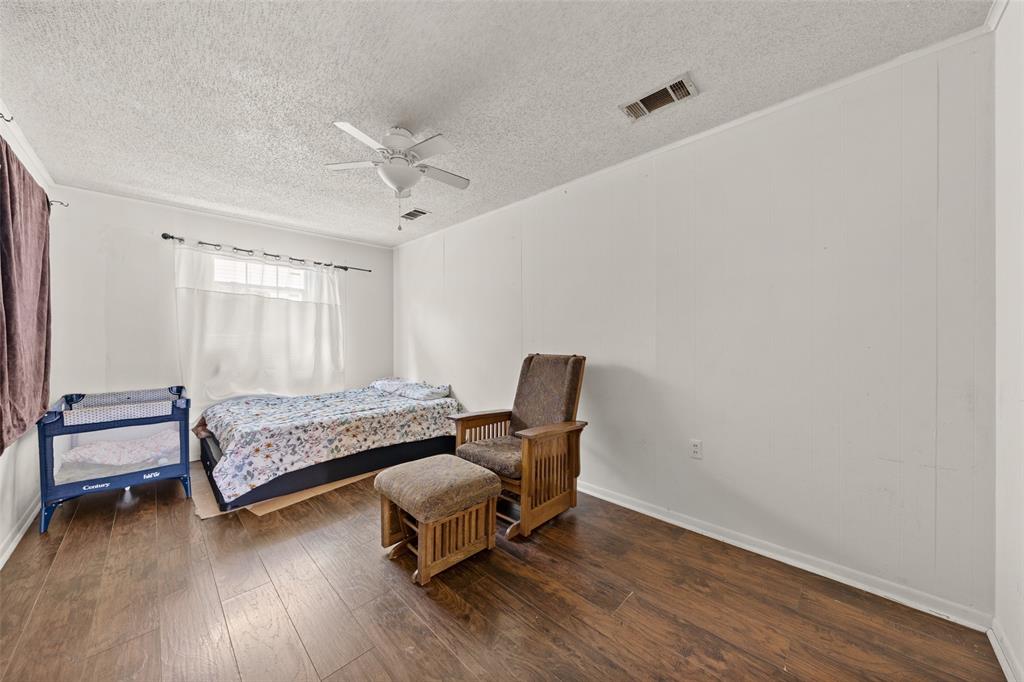 3524 Live Oak Avenue Waco, TX 76708 - Photo 10 of 19 a bedroom with a bed and a window